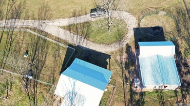 Situated on the banks of the beautiful, clear Caddo River, this - photo 2