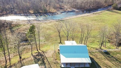 Situated on the banks of the beautiful, clear Caddo River, this - photo 5