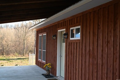 Situated on the banks of the beautiful, clear Caddo River, this - photo 9