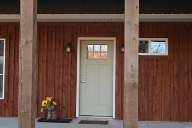 Situated on the banks of the beautiful, clear Caddo River, this - photo 10