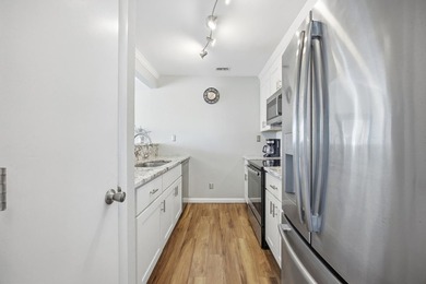Top-floor end unit with beautiful beach views and excellent - photo 5