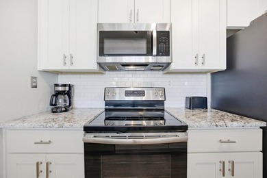Top-floor end unit with beautiful beach views and excellent - photo 6