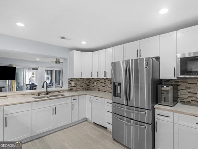 Lakefront Living! Experience serene lakefront living in this - photo 15