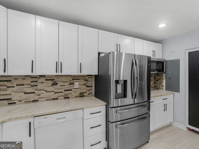 Lakefront Living! Experience serene lakefront living in this - photo 16