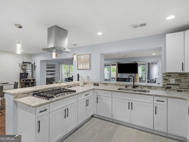 Lakefront Living! Experience serene lakefront living in this - photo 18