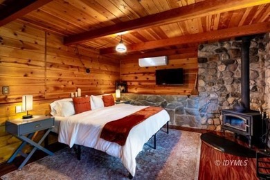 Perched on a gently sloping hillside among granite boulders and - photo 18