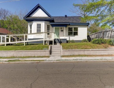 Wow! Check out this stunning 3-bedroom, 2-bath home in town that