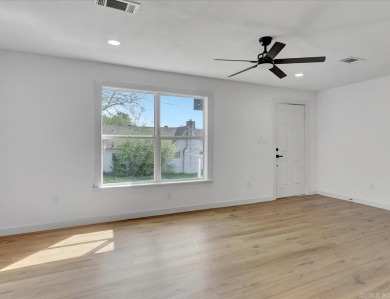 Wow! Check out this stunning 3-bedroom, 2-bath home in town that