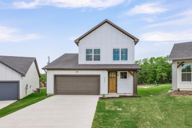 Lake Home For Sale in Runaway Bay, Texas