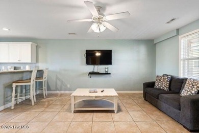 Experience coastal living at its finest with this stunning