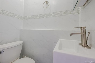 Welcome to 2368 Woodhull Avenue, located in the heart of the - photo 7
