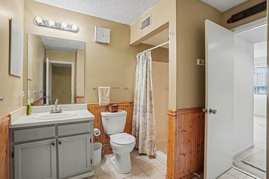 Walk to the beach from this charming top floor end unit 2 bed 2 - photo 14