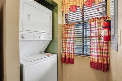 Walk to the beach from this charming top floor end unit 2 bed 2 - photo 15