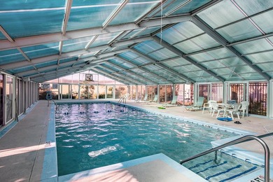 Walk to the beach from this charming top floor end unit 2 bed 2 - photo 18