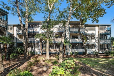 Walk to the beach from this charming top floor end unit 2 bed 2 - photo 21