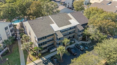 Walk to the beach from this charming top floor end unit 2 bed 2 - photo 22