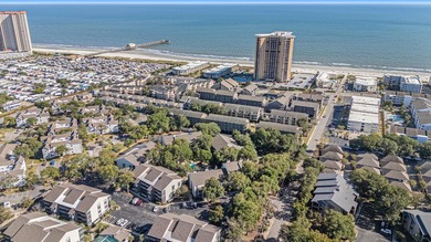 Walk to the beach from this charming top floor end unit 2 bed 2 - photo 23