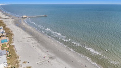 Walk to the beach from this charming top floor end unit 2 bed 2 - photo 26