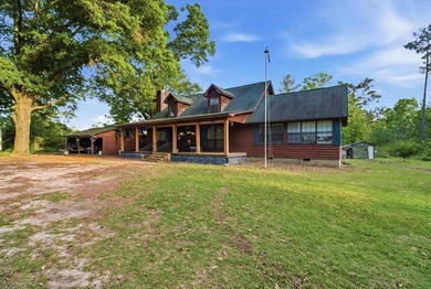 Nestled on approximately 36.5 acres in Gordon, Alabama, this - photo 3