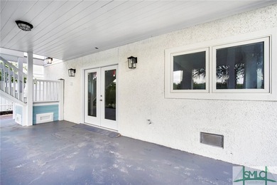 Tucked away on the quiet and highly coveted North Beach, this - photo 4