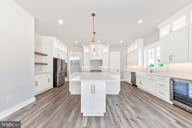 Welcome to Woodridge, where refined lake living meets modern - photo 18