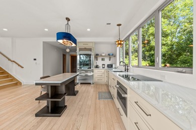 This luxurious, one-of-a-kind estate offers a multi-million - photo 6
