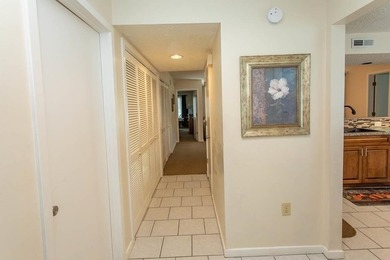 This stunning three-bedroom, two-bath, first floor villa, offers - photo 3