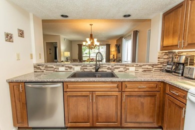 This stunning three-bedroom, two-bath, first floor villa, offers - photo 6