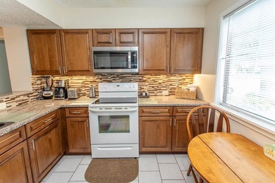 This stunning three-bedroom, two-bath, first floor villa, offers - photo 7