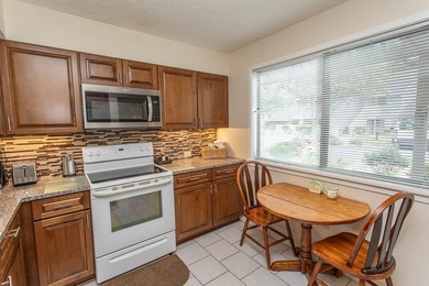 This stunning three-bedroom, two-bath, first floor villa, offers - photo 8
