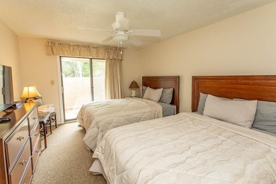 This stunning three-bedroom, two-bath, first floor villa, offers - photo 10