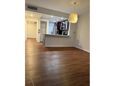 Experience the best of Pine Island Ridge in this spacious rarely