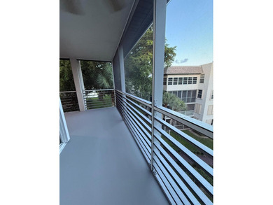 Experience the best of Pine Island Ridge in this spacious rarely