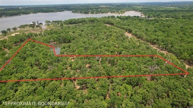 Beautiful elevated 4-acre lot with a deeded boatslip (#42) that - photo 2