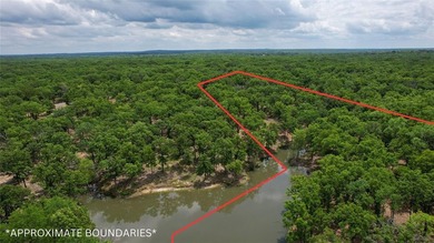 Beautiful elevated 4-acre lot with a deeded boatslip (#42) that - photo 8