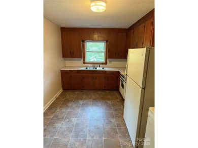 This adorable ranch is a great opportunity, all it needs is your