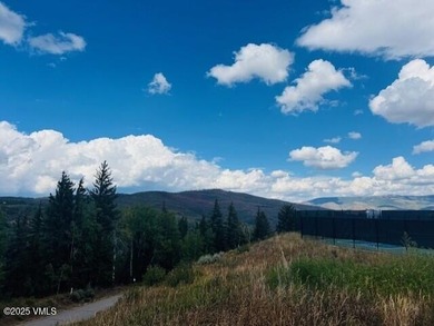 Nestled amongst tall pines and mature aspen trees you will