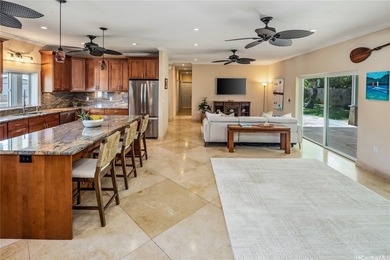 Fully remodeled in 2013, this elegant beachside home on Namala - photo 8
