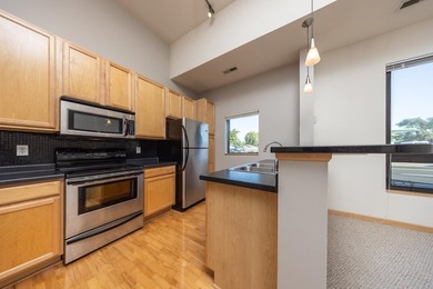 This beautiful condo is a standout with its soaring 16-foot - photo 2