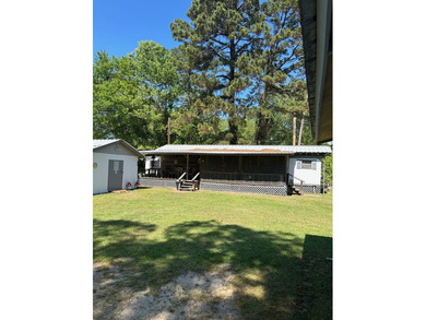 Nestled just one block from Toledo Bend Lake, this tidy two-bed - photo 3
