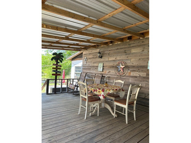Nestled just one block from Toledo Bend Lake, this tidy two-bed - photo 5
