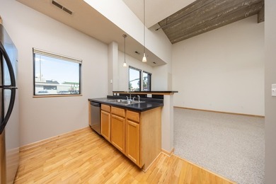 This beautiful condo is a standout with its soaring 16-foot - photo 5