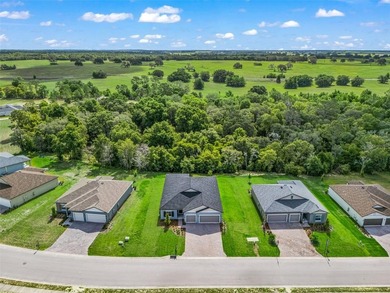 Virtually Staged. Nestled within the gated golf community of - photo 3