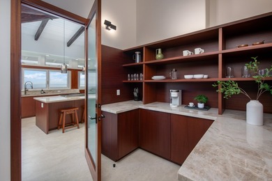 A newly reimagined oceanfront masterpiece perched above the - photo 11