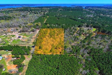 Discover 7.582 acres of unrestricted land ideally located near - photo 1