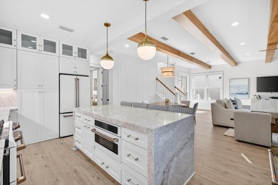 Discover the epitome of coastal luxury at 305 Elm St. in the - photo 12