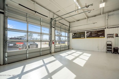 Over 100 feet of road frontage with a center turning lane and - photo 13