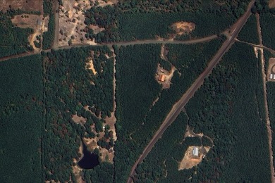 Discover 7.582 acres of unrestricted land ideally located near - photo 5
