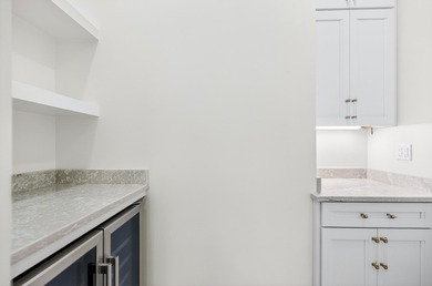 Discover the epitome of coastal luxury at 305 Elm St. in the - photo 16