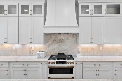 Discover the epitome of coastal luxury at 305 Elm St. in the - photo 17